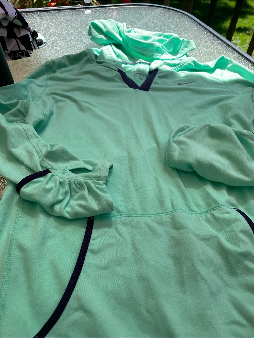Nike’s Mint Green V-Neck Pullover Hoodie with Navy Trim
